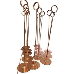 Rose gold metal table number or sign holders. Set of 12